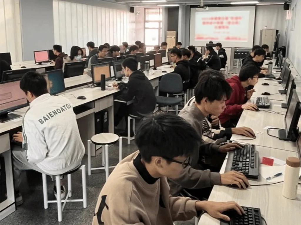 Students building a gesture game together in the game development course